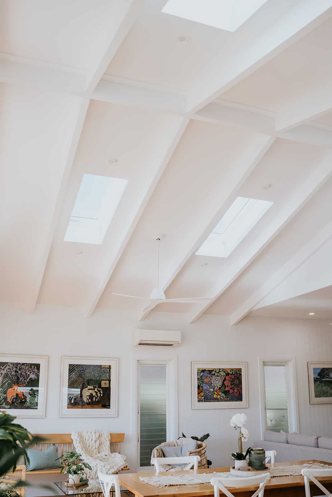 Raked ceilings with velux skylights and exposed rafters