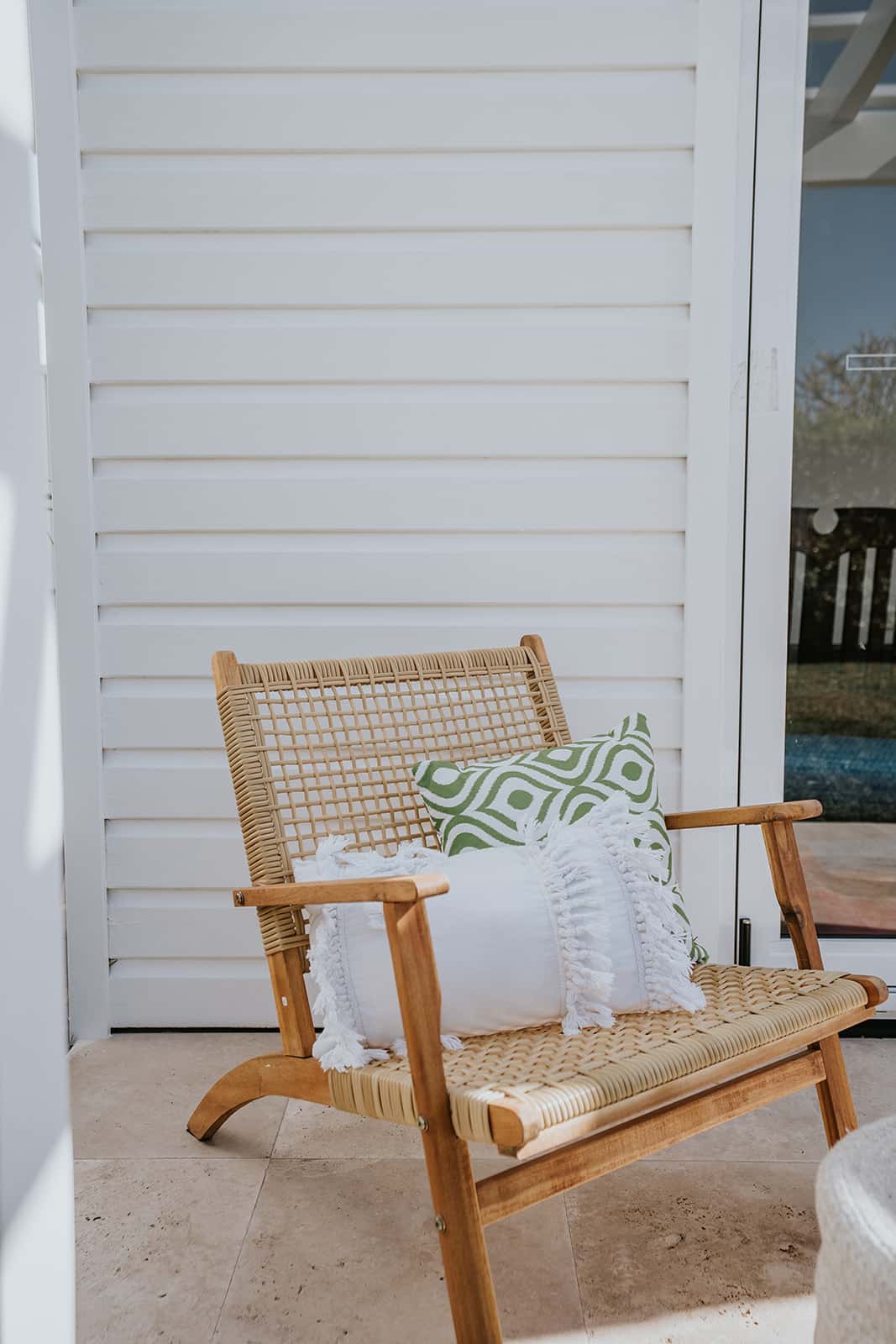 Hamptons style cladding and beach chair Locspec Building