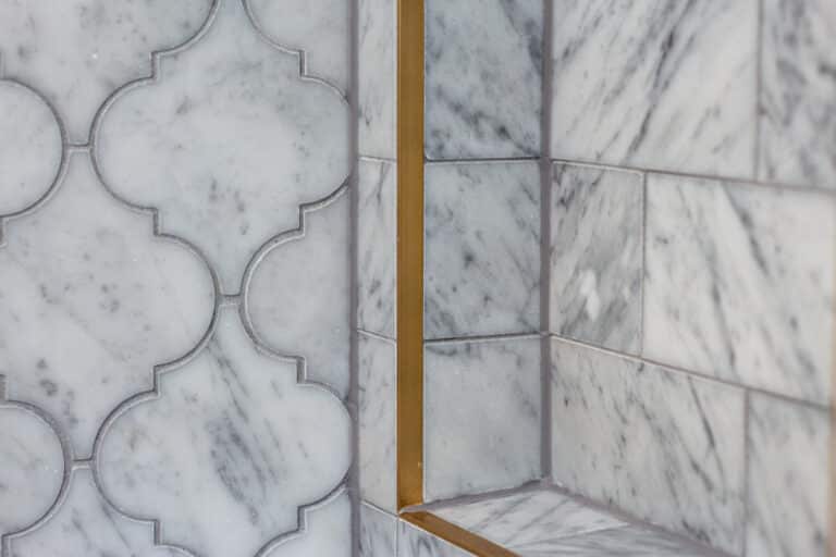 Modern bathroom renovation with marble tiles